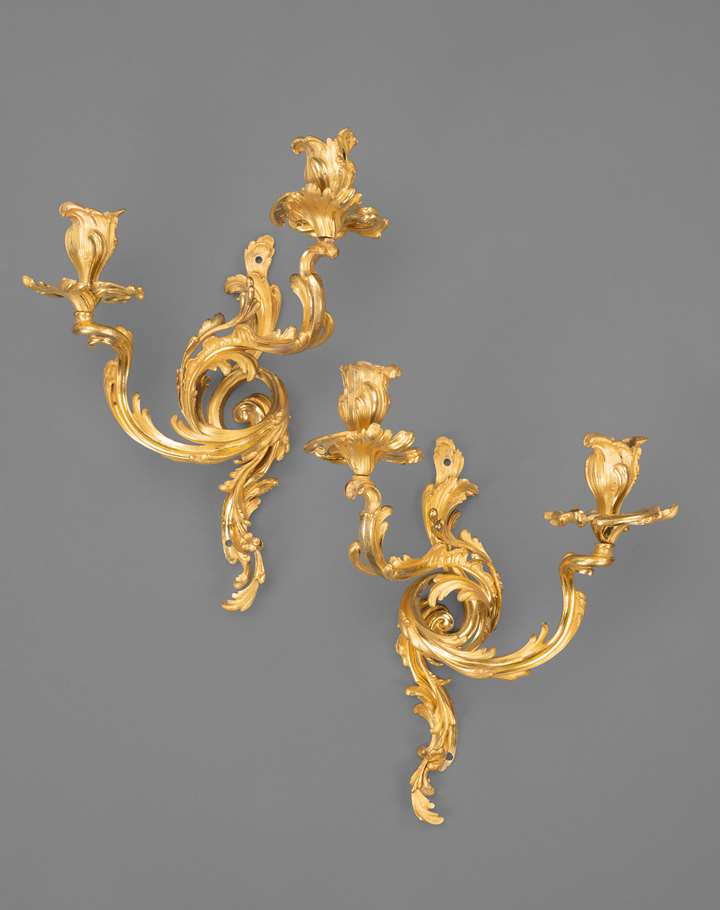 A pair of Louis XV Ormolu wall lights